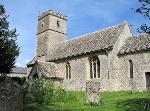 Cotswold stone church with a tower