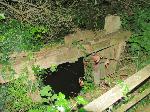 Overgrown sluice