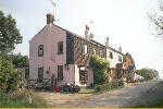 Weatherboard cottages near North Benfleet Hall
